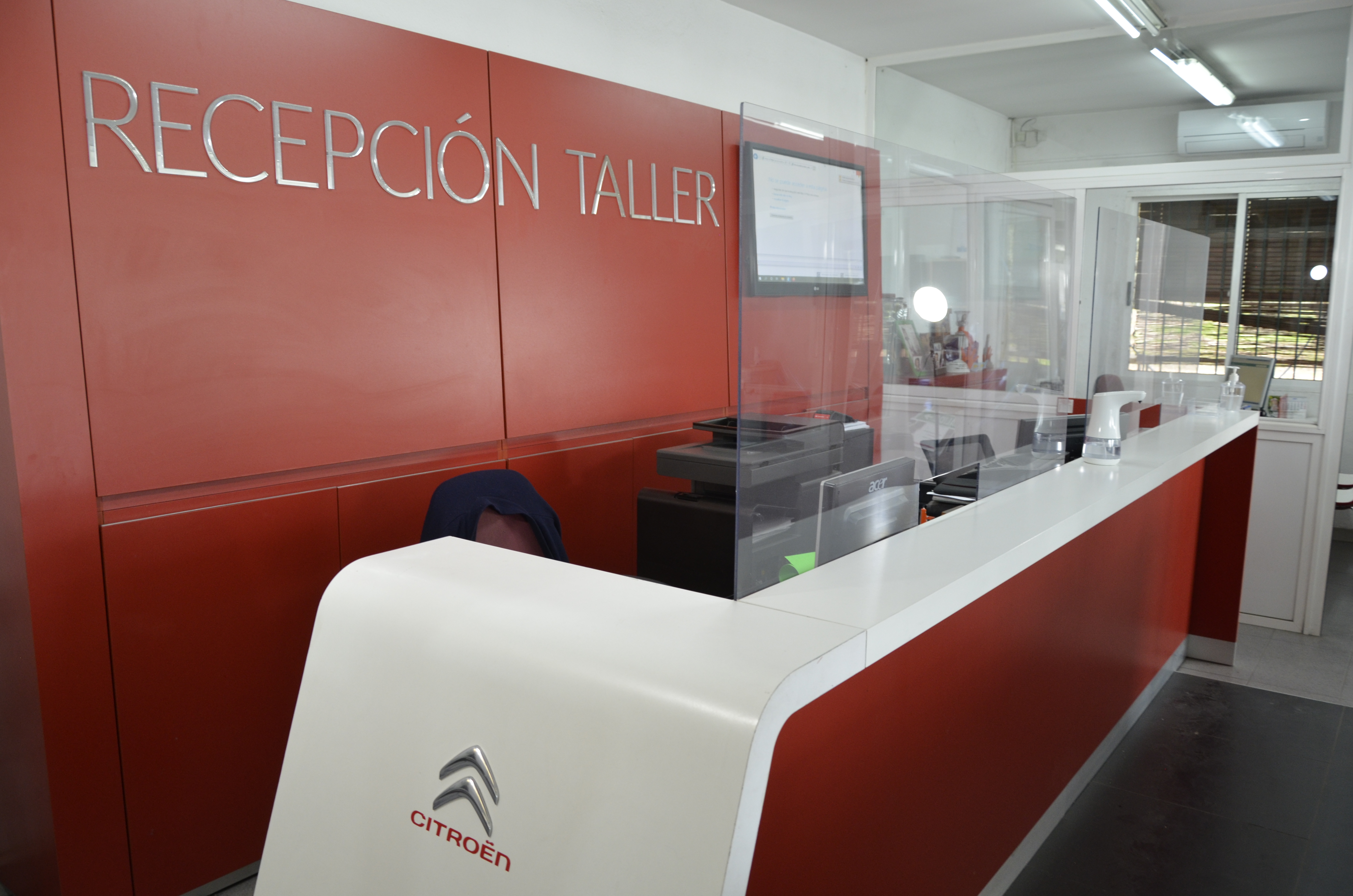 Recepción taller Autos Garro